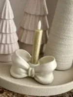 beige strik kandelaar