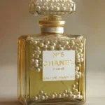 Glasschilderij met goudfolie 60x80cm Parfum goud met parels